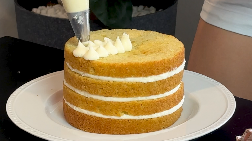decorating a cake on a plate