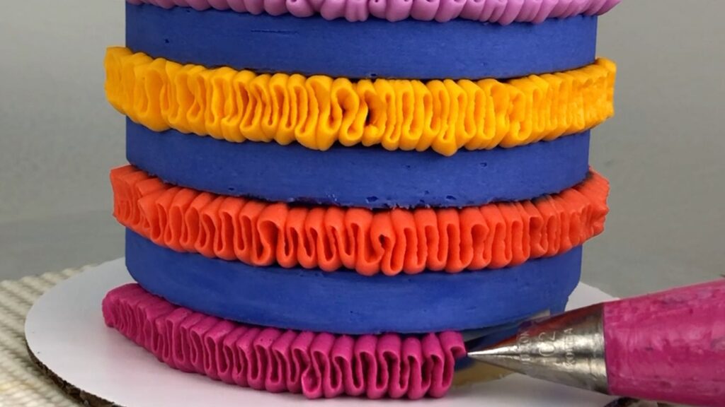 striped ruffle cake using a striped cake comb