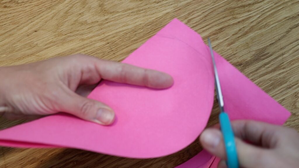 cut a heart template to make a heart cake