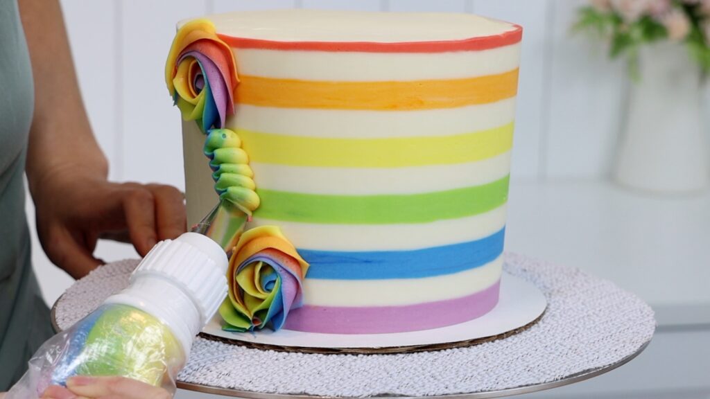 rainbow piping on a cake