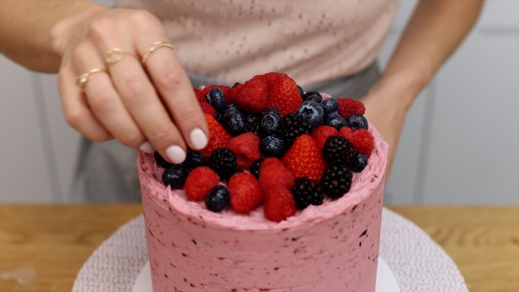 how to attach berries to a cake