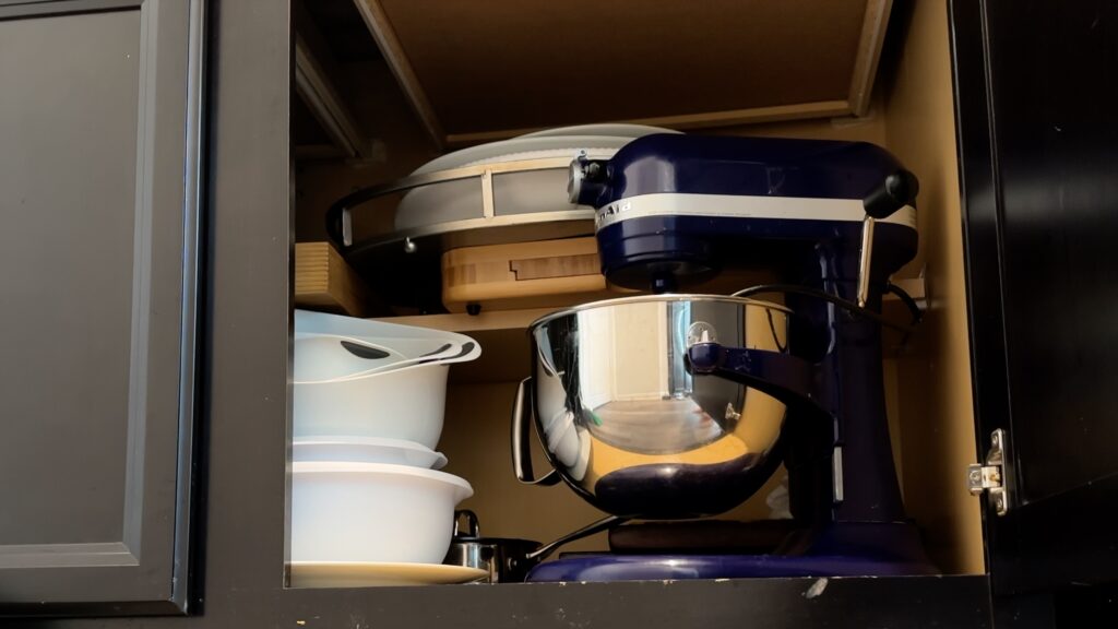 maximize countertop space for cake decorating by storing appliances in cabinets