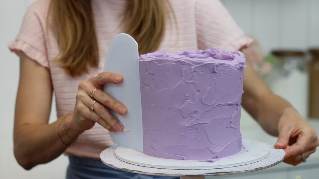 smooth the frosting before using a striped cake comb