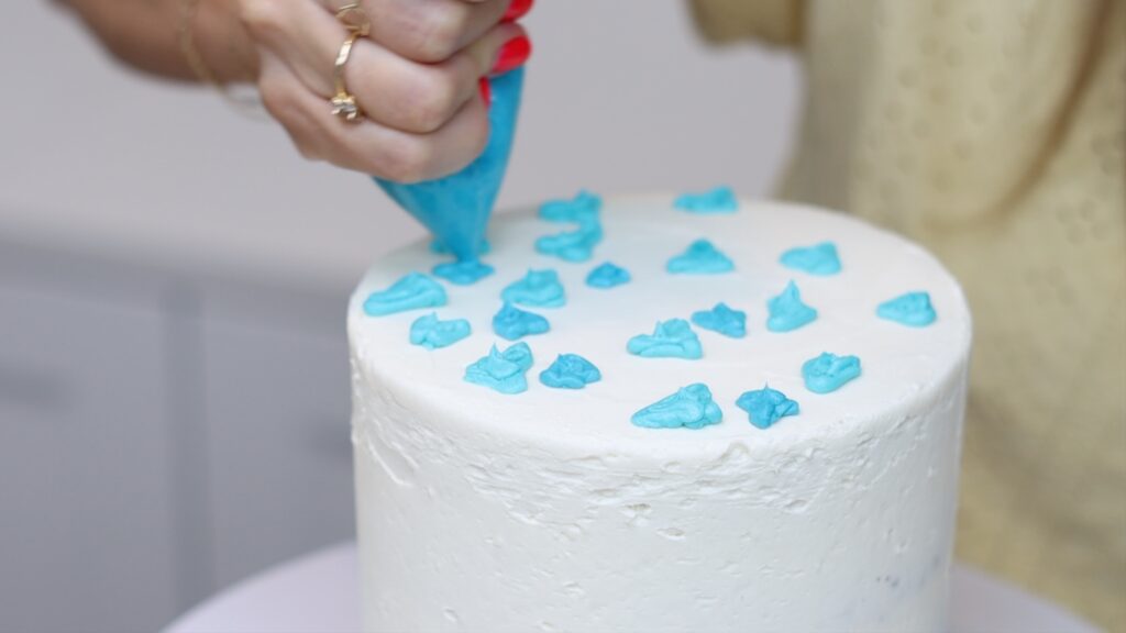 pipe tiles onto the top of the cake