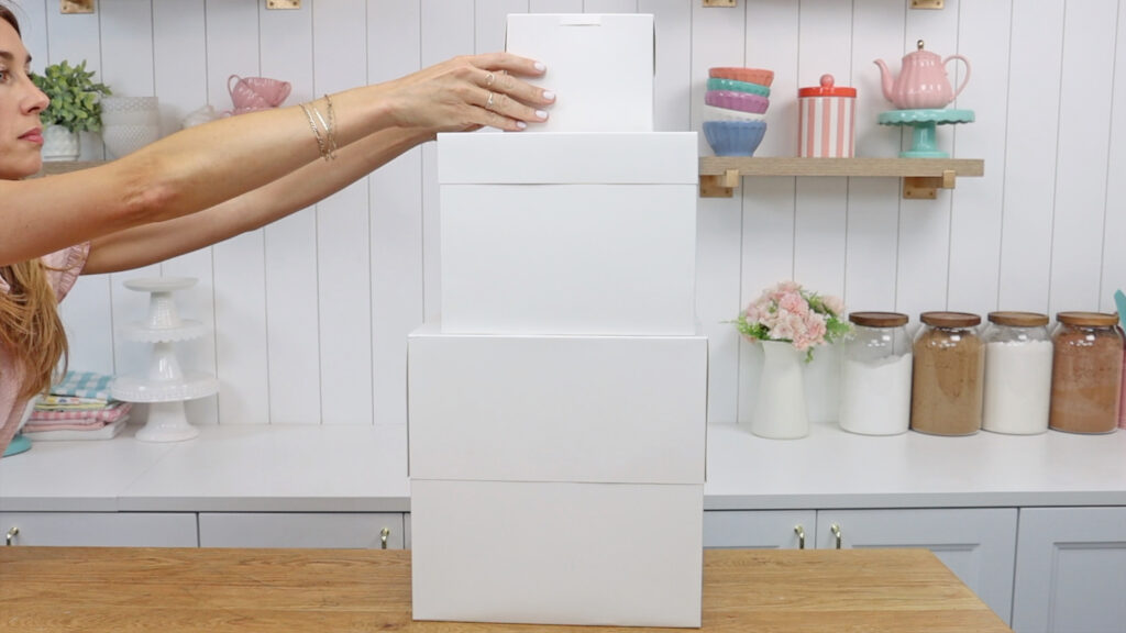Three different sized cake boxes