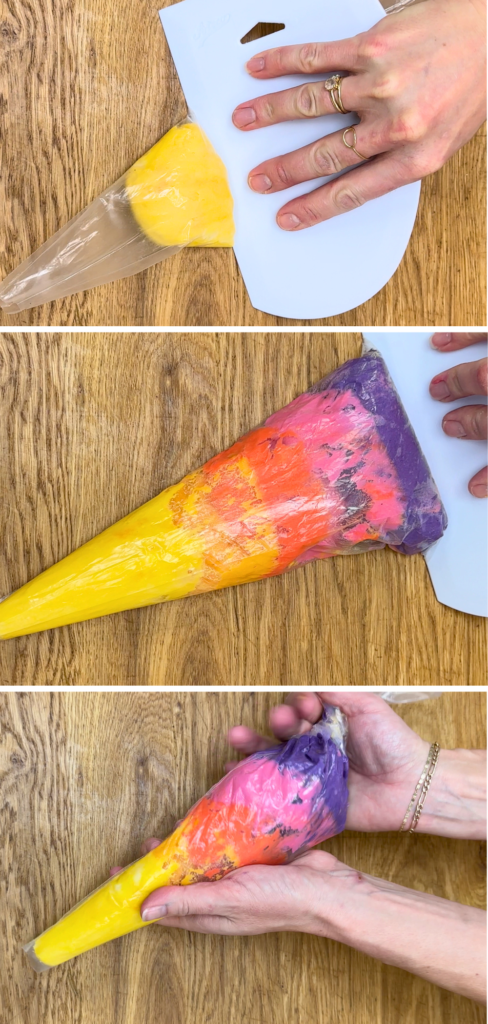 Layering coloured buttercream into a piping bag to create blended and ombre Valentine’s Day cake ideas